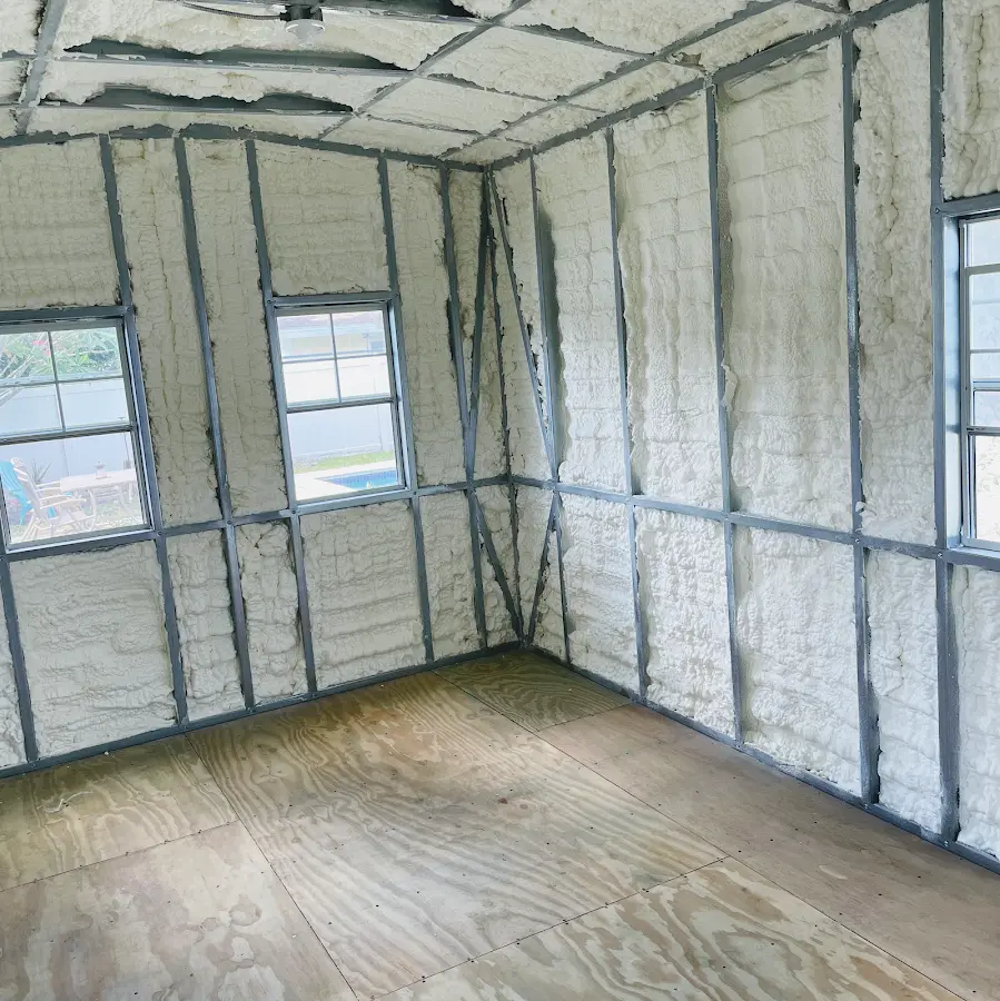 Closed-cell spray foam insulation applied to wall cavities in a residential project in New Bedford